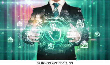 Businessman holding touch user interface icon in his hands with multiple technology symbols around it - Powered by Shutterstock