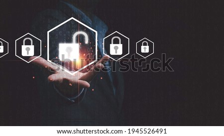 Businessman holding Unlock master key with lock key for access technology security information concept.