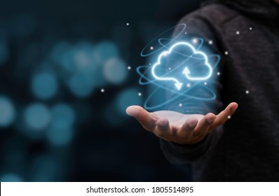 Businessman Holding Virtual Cloud Computing To Transfer Data Information And Upload Download Application. Technology Transformation Concept.