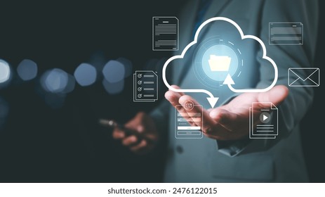 Businessman holding virtual cloud computing for online document management, Innovation technology, Knowledge, Searching for new idea to development digital document system, digital file storage, DMS.