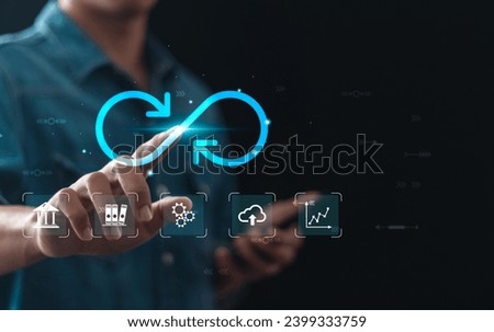 Businessman holding virtual Infinity symbol with technology marketing online icon for Circular economy and infinite. Strategy of investment, Banking and financial.