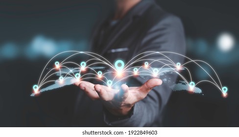 Businessman Holding Virtual World Map With Location Icon And Connection Line For Business Technology Global Network Concept.