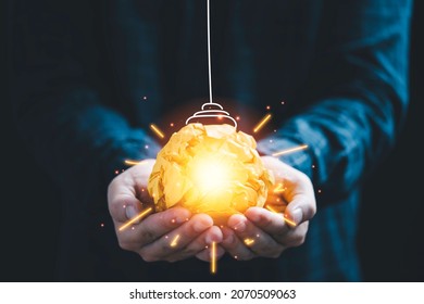 Businessman Holding Yellow Scrap Paper With Graphic Light Ray For Sign Of Creative Thinking Idea And Innovation Concept