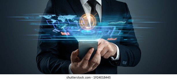 The businessman holds in his hand a smartphone with a virtual screen. Building on a modern interface, online shopping. Concept for digital marketing, plan and strategy, mobile technologies