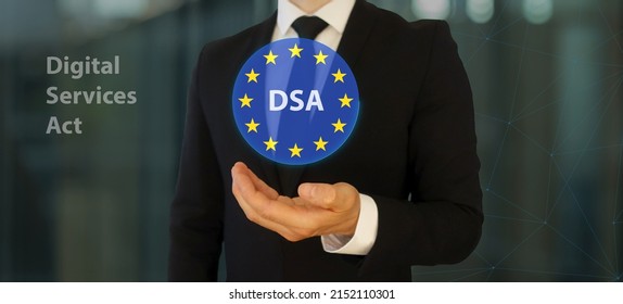 Businessman Holds A Sphere With The Stars Of The European Union. Content Text DSA (Digital Services Act) Which Is Intended To Update The Legal Framework For Online Platforms In The EU.