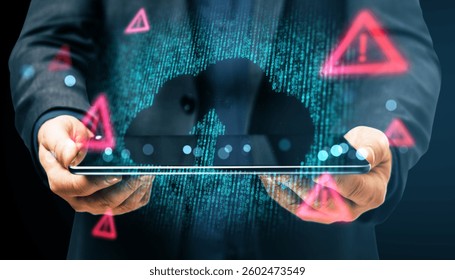 Businessman holds tablet with digital cloud and binary code, warning symbols overlay, on dark background. Concept of cybersecurity and data protection - Powered by Shutterstock - Get 15% off with code: PIKWIZARD15