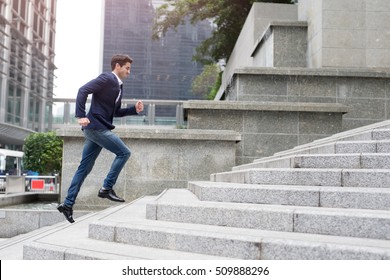 Businessman in hurry. Motion blurred people over office building in hongkong - Powered by Shutterstock