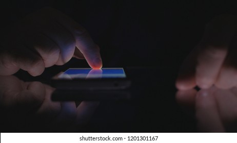Businessman Image Using Mobile Wireless Application in Darkness