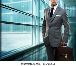 Businessman inside modern building - Powered by Shutterstock