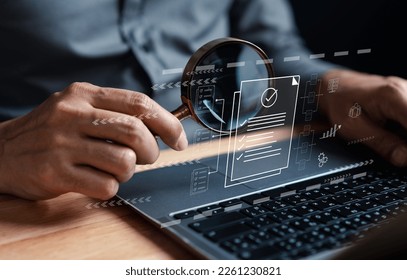 Businessman Inspecting Paperwork Document of Business Data Analysis working Management report with KPI and metrics connected to database. Corporate strategy for finance, operations, sales, marketing.