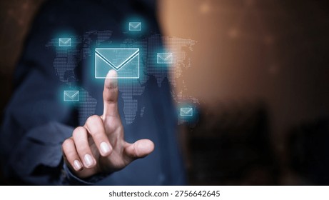 Businessman interacting with digital email interface on virtual screen with global network background. Concept of email marketing, communication technology, data exchange and business connectivity.