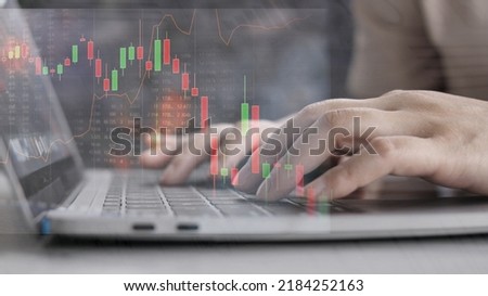 Businessman interacting with laptops, phones, and tablets with featuring stock tickers or graphs, cryptocurrency and new trading platforms, ideas and perspectives,See stock charts,