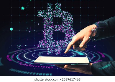 Businessman interacts with a virtual Bitcoin hologram above a tablet, featuring a glowing digital interface on a dark background, symbolizing cryptocurrency