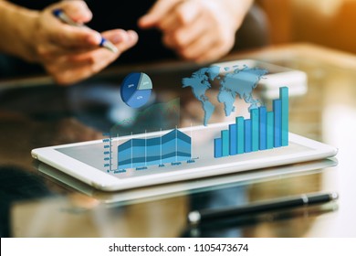 businessman investment consultant analyzing company financial report balance sheet statement working with digital graphs. Concept picture for stock market, office, tax,and project. 3D illustration. - Shutterstock ID 1105473674