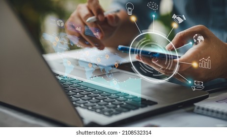 Businessman investor analyzing company financial mutual fund report working with digital augmented reality graphics technology. Concept for business, economy and marketing. - Shutterstock ID 2108532314