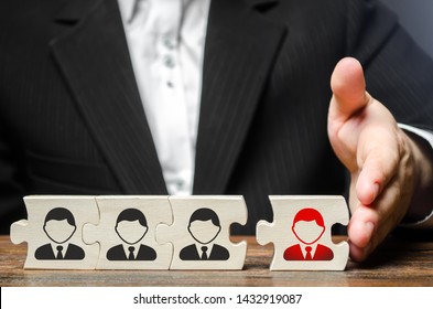 A Businessman Joins A New Employee To The Team As Its Leader. Assembly Of The New Business Team For The Project From The Proven Employees. Increasing Efficiency. Work With Staff, Business Organization