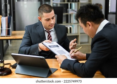 Businessman Or Judge Consult And Conference Having Team Meeting With Client At Law Firm In Modern Office
