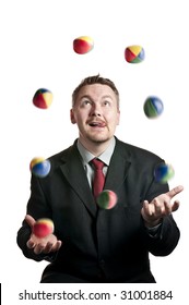 A Businessman Juggling Balls On White Background