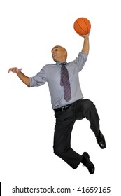 Businessman Jumping With Basketball For A Dunk Isolated In White