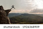 businessman jumps over the abyss, business concept