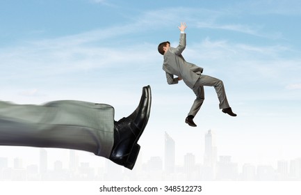 Businessman kicked by his boss big foot