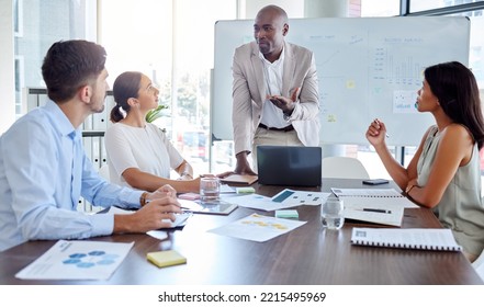 Businessman Leadership Speaking To Employee For Coaching, Mentorship And Economy Planning In Corporate Company, Office And Discussion. Black Man Financial Conversation, Presentation And Meeting Staff