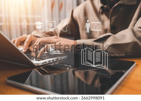 Businessman or learner using laptop to access e-learning education, video tutorials, internet lessons, and online courses on a digital screen, highlighting modern online learning methods.