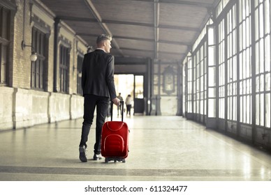 Businessman leaving the city for work