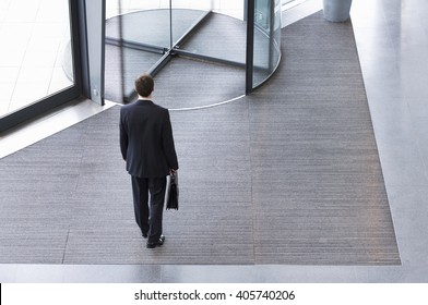 A businessman leaving office