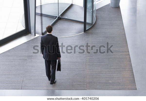 A businessman leaving\
office