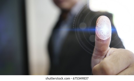 Businessman login with fingerprint scanning technology. fingerprint to identify personal, security system concept                                       