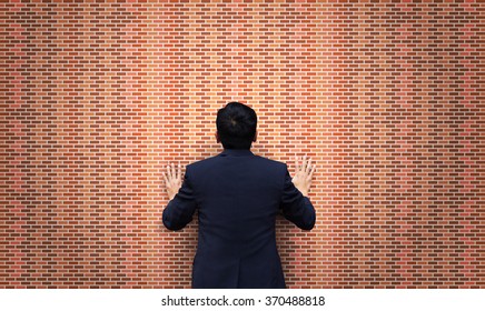 Businessman look at brick wall. Stalemate. Problem. - Shutterstock ID 370488818