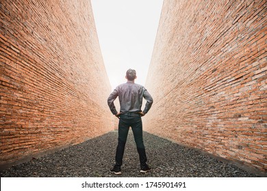 Businessman Look At Brick Wall. Businessman Trying To Escape From Difficult Situation. Business People Stopped By A Brick Wall. Business With Dead End. Stalemate. Problem.