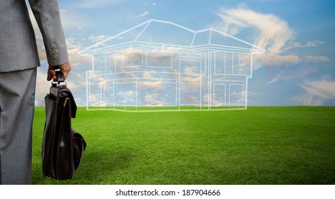 Businessman Look At Dream House