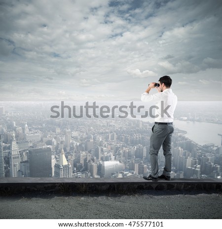 Businessman looking to the future