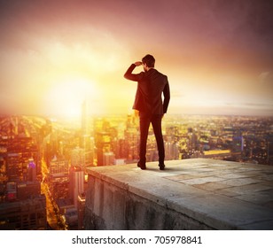 Businessman looking to the future for new business opportunity - Shutterstock ID 705978841