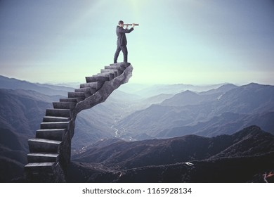 Businessman looking into the distance on abstract stairs. Landscape background. Research and vision concept  - Shutterstock ID 1165928134
