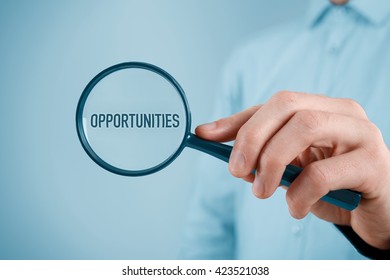 Businessman is looking for market opportunities. Marketing specialist focused on opportunities (SWOT analysis). - Shutterstock ID 423521038