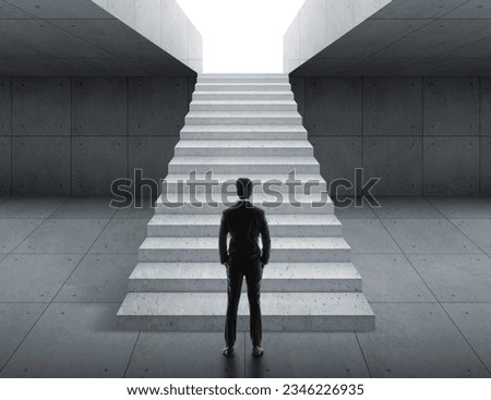 Businessman looking at stairs. business start concept