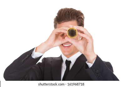 Businessman Looking Through Telescope Isolated On White Background