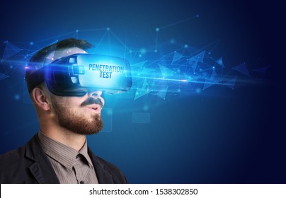 Businessman looking through Virtual Reality glasses with PENETRATION TEST inscription, cyber security concept