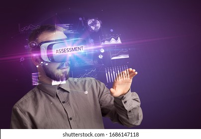 Businessman Looking Through Virtual Reality Glasses With ASSESSMENT Inscription, New Business Concept