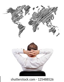 businessman looking at world map
