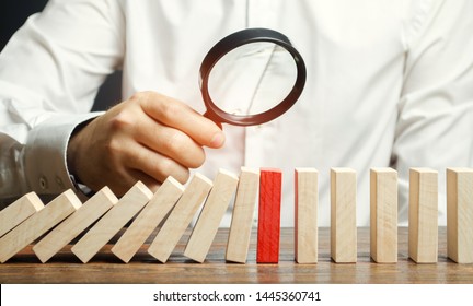 Businessman looks on collapse domino effect. Stress resistance business. Financial stability. Recovery business. Evaluation of cash risks. Creating a strategy. Management and planning. Decision making - Shutterstock ID 1445360741