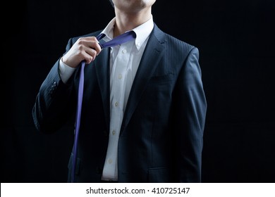 Businessman, Loosen The Tie