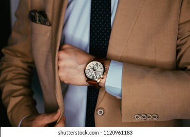 Businessman Luxury Style. Men Style.correct Button On Jacket, Hands Close-up, Dressing, Man's Style, Stylish Man.Fashion Portrait Of Young Businessman Handsome Model Man In Casual Cloth Suit.