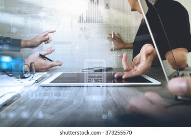 Businessman making presentation with his colleagues and business strategy digital layer effect at the office as concept           - Shutterstock ID 373255570