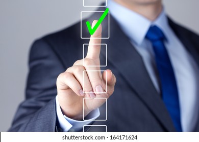 Businessman Making Right Decision Touching Screen Interface