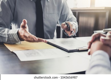 Businessman and Male lawyer or judge consult having team meeting with client, Law and Legal services concept. - Shutterstock ID 1043656987