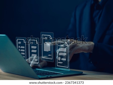 businessman manages data on a laptop, document files digital electronic. concept Enterprise Resource Planning system or ERP is software for management recorded in a Database. business paperless